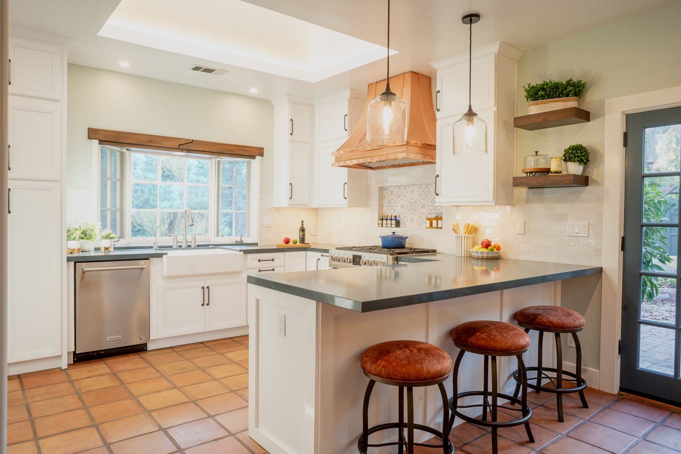 Contemporary Spanish Kitchen Remodel in Fresno, CA by Imagine Remodeling project photo
