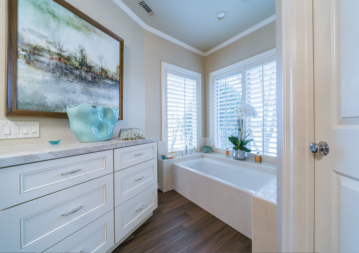 Bathroom remodel in Fresno with tub in front of window by Imagine Remodeling