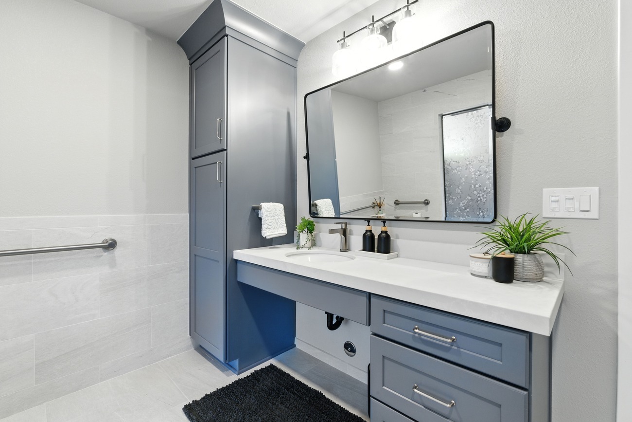 Gray accessible bathroom vanity with large mirror and storage in Fresno Gray accessible bathroom vanity with large mirror and storage in Fresno