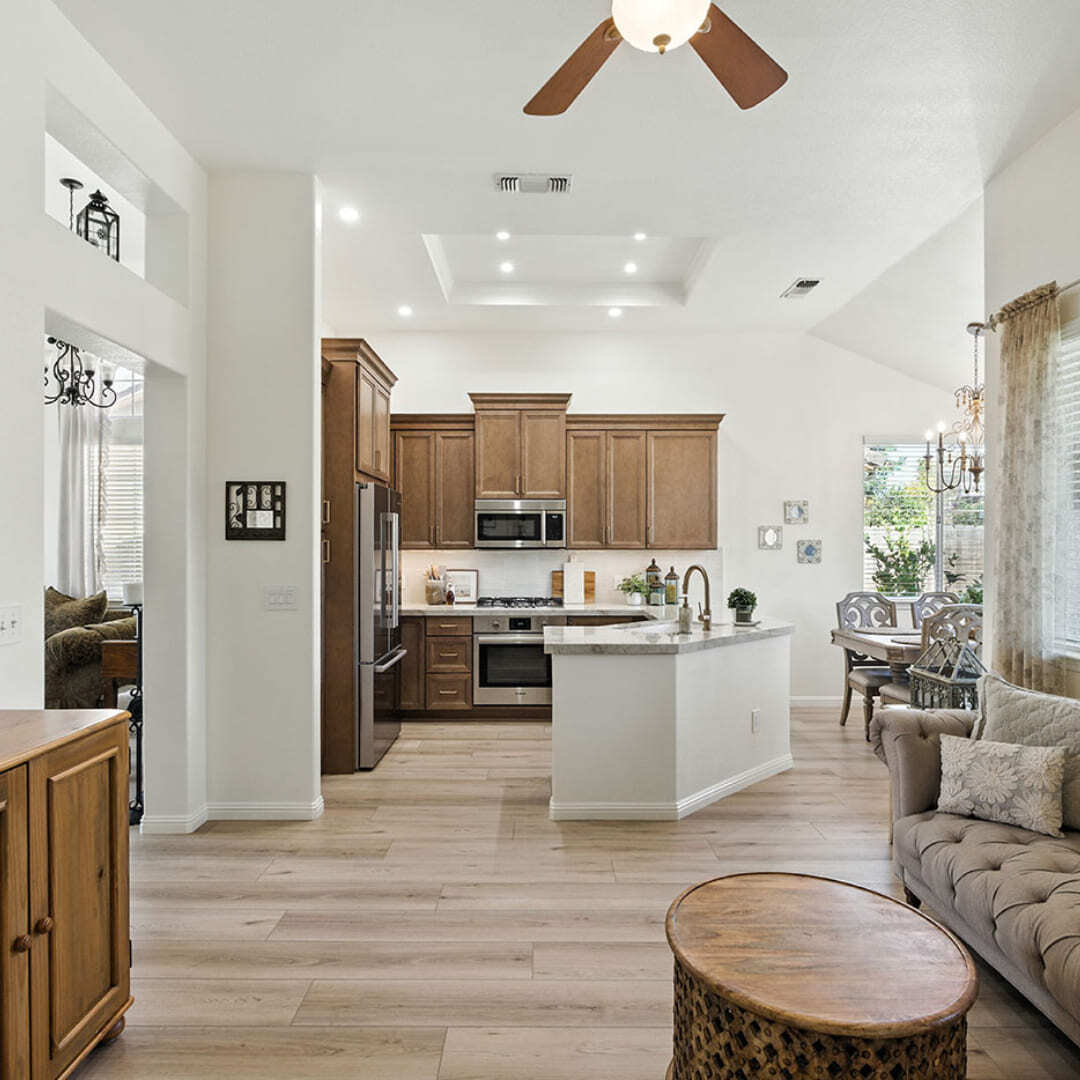 Bright open-concept living area remodeled by Imagine Remodeling in Fresno with warm tones and modern finishes Bright open-concept living area remodeled by Imagine Remodeling in Fresno with warm tones and modern finishes